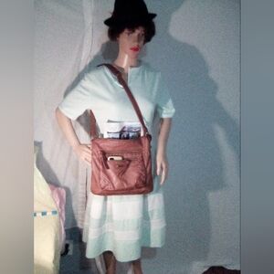 Stone Mountain Cross Body in Brown